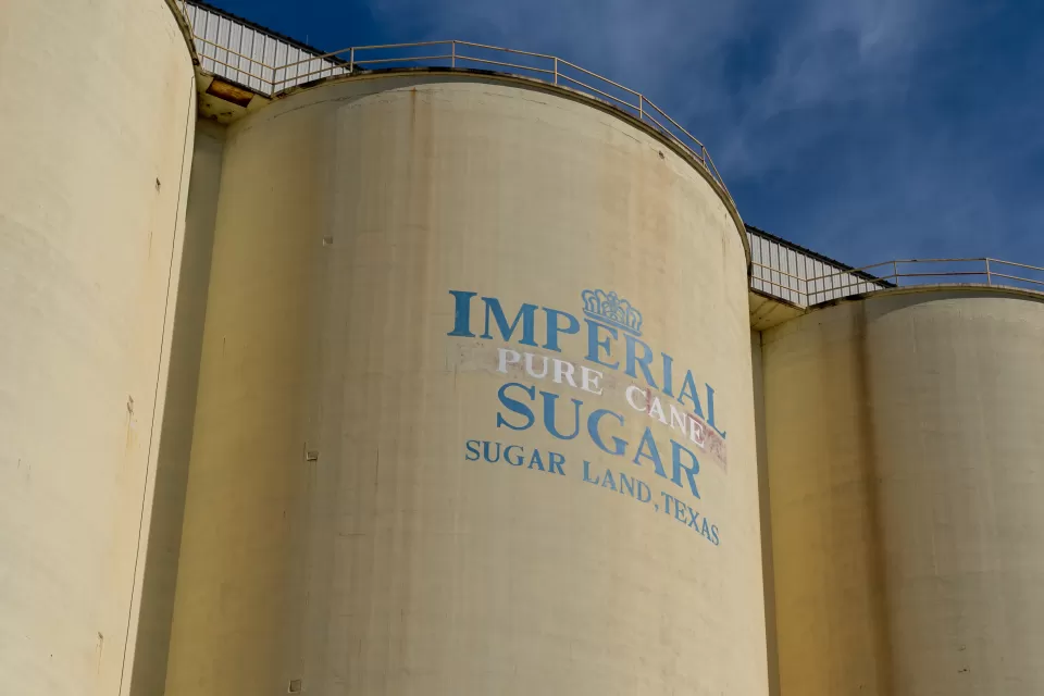 Close-up of silos with Imperial Sugar logo in Sugar Land, Texas